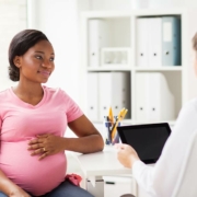 Getting Pregnant: Woman at Madison OBGYN discussing pregnancy