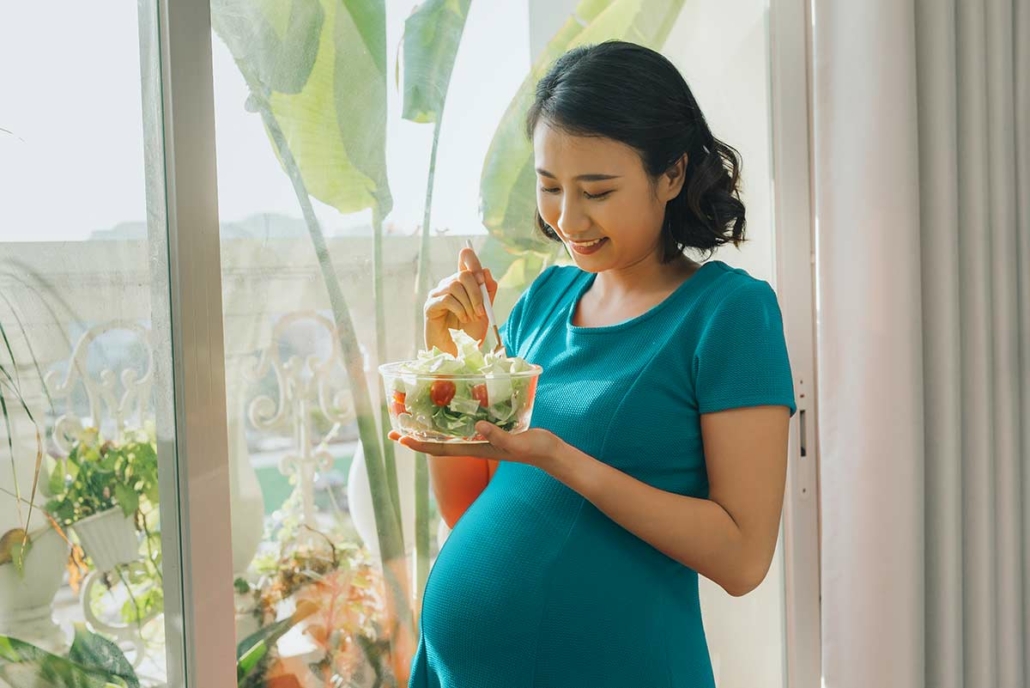 Pregnant Woman Eating Healthy Food