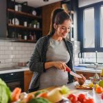Pregnant woman preventing gestational hypertension with healthy food