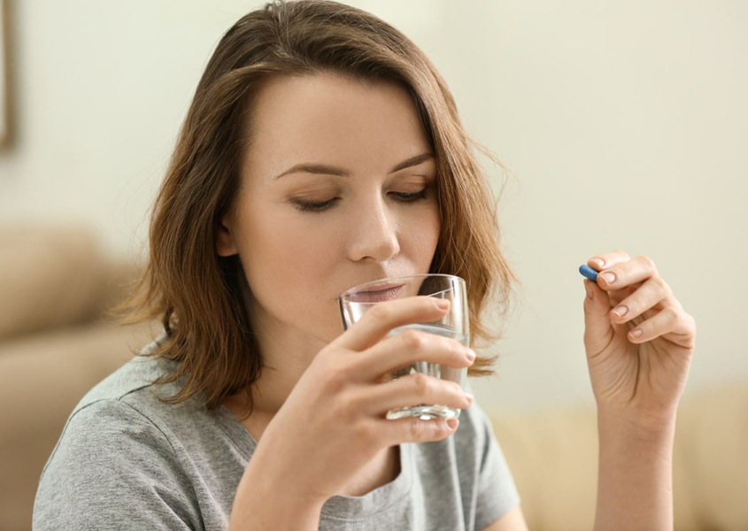 Pregnant woman takes medications