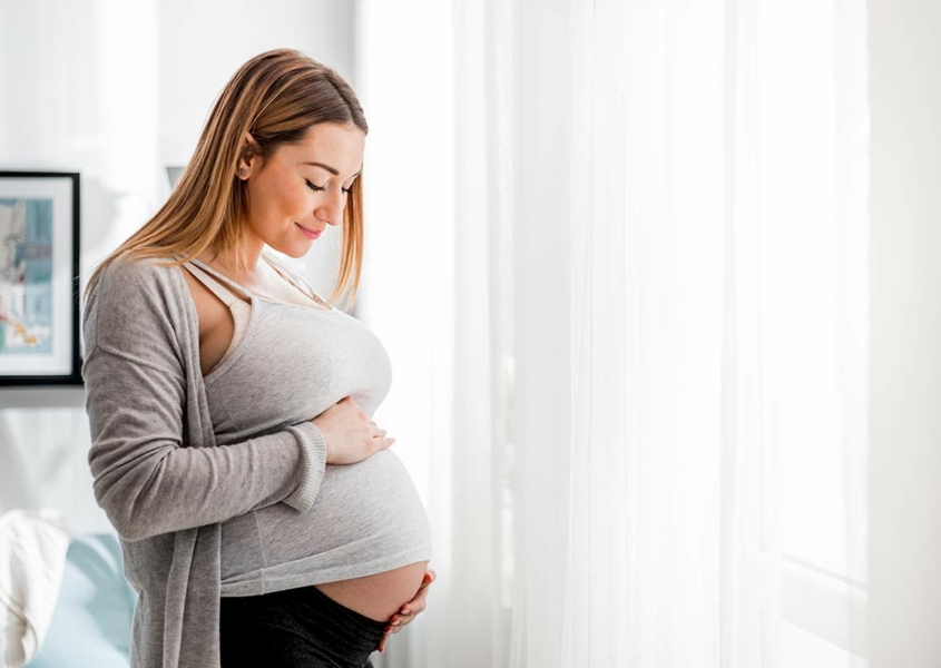 Pregnant woman managing and preventing infections during pregnancy
